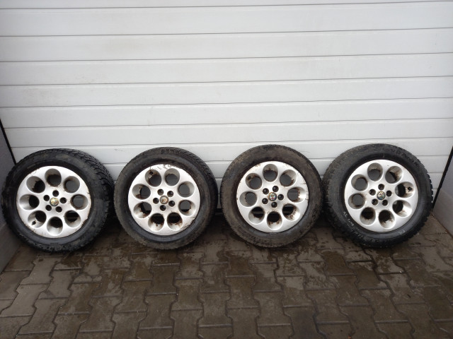 Original alu Alfa Romeo 147/156/GT R15 sada M18
